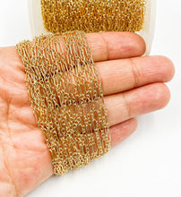 Load image into Gallery viewer, 14kt Gold Filled One of 1.6mm Width by 5.0mm Length Smooth Larger Oval Link Followed by Three of 1.6mm Width by 2.0mm Length Smooth Smaller Oval Links With Middle Smaller Oval Link, Long and Short Chain. Price per: 1 Foot.