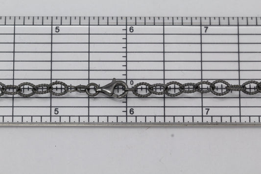 Sterling Silver Black Diamond, 5.4mm Width by 7.2mm Length, 24 Inch Twisted Cable Chain with 11.0mm Length by 3.0mm Thick, Trigger Lobster Clasp. Quantity Per Pack: 1 Piece.