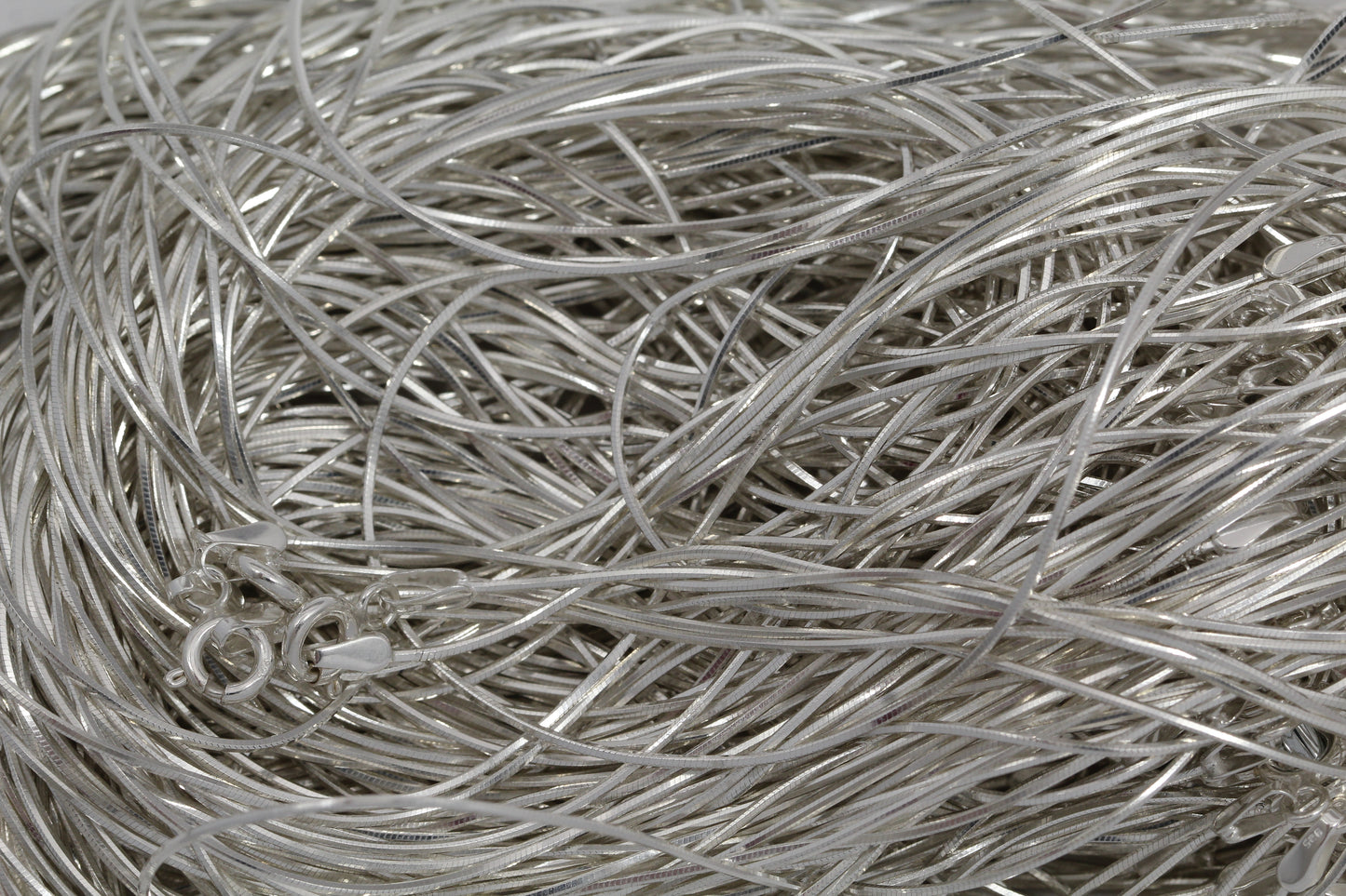 Sterling Silver, 0.7mm Width / Length, 16 Inch Square Regular Snake Chain with 6.0mm Width / Length by 1.4mm Thick, Smooth Spring Ring Clasp and Tags Ends. Quantity Per Pack: 1 Piece.