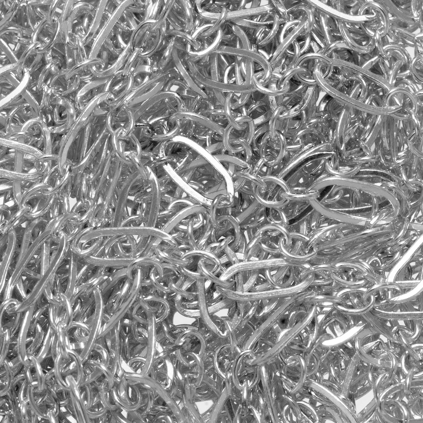 Sterling Silver 2.4mm Width by 5.4mm Length, Flat Oval Link follwed by Three of 1.8mm Width by 2.1mm Length Smooth Oval Links, Long and Short Chain. Price per: 1 Foot.