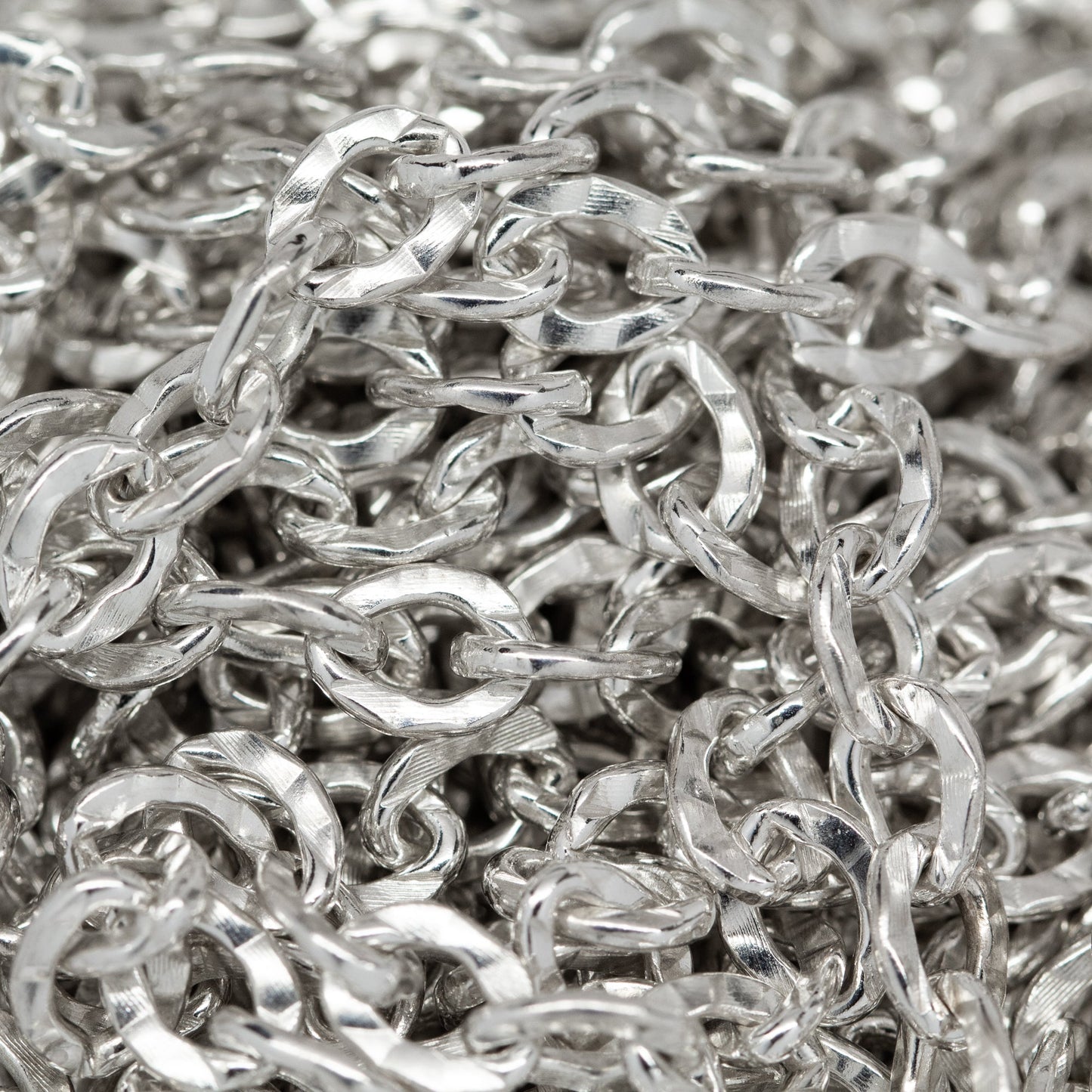 Sterling Silver 4.2mm Width by 5.5mm Length, Hammered Cable Chain. Price per: 1 Foot.
