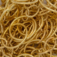 Load image into Gallery viewer, 14kt Gold Filled 11.1mm Width by 17.3mm Length Smooth Figure 8 Link Followed by Three of 4.3mm Width by 6.7mm Length Textured Oval Links, Figure 8 Chain. Price per: 1 Foot.