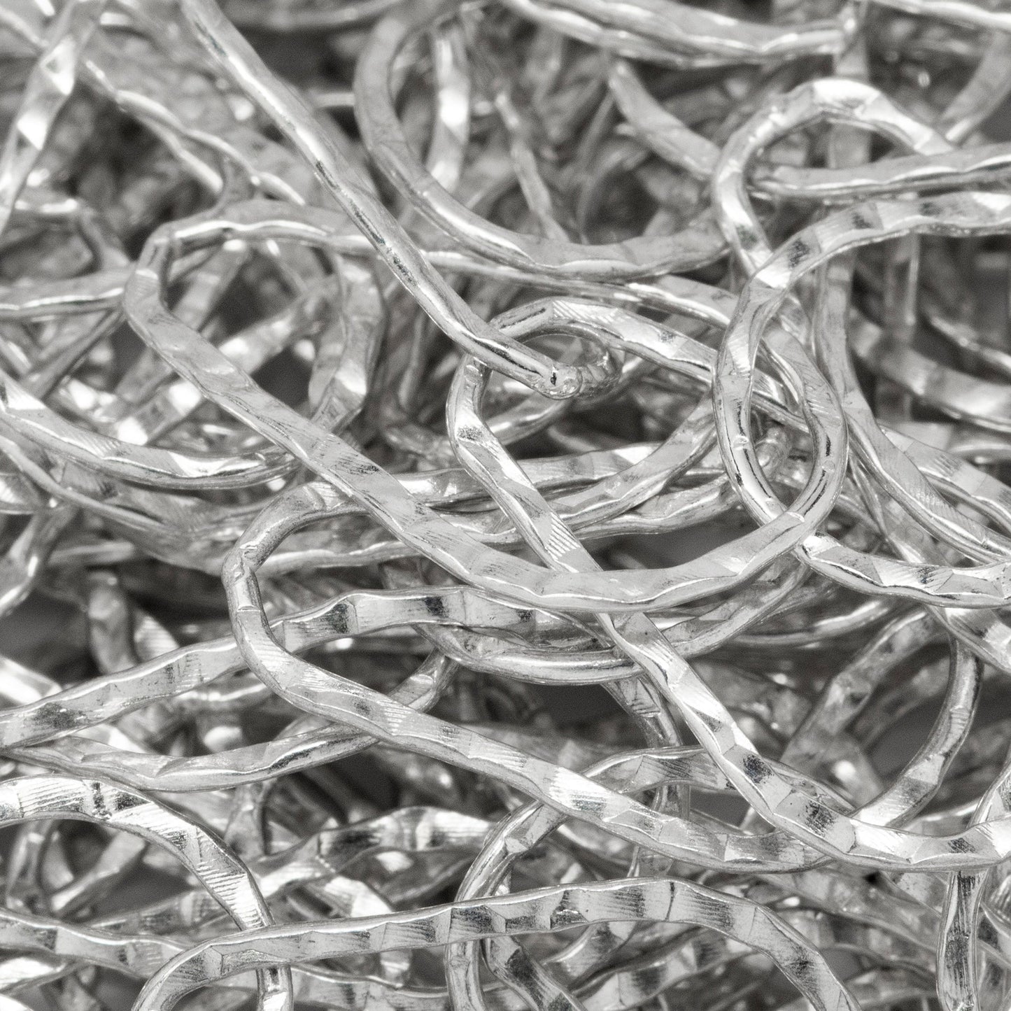 Sterling Silver 10.6mm Width by 17.9mm Length, Pear Shaped Hammered Cable Chain. Price per: 1 Foot.
