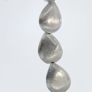 German Silver, 16.3mm Width by 12.2mm Length by 6.1mm Height, Teardrop Bali Bead. Quantity per pack: 14 pieces.