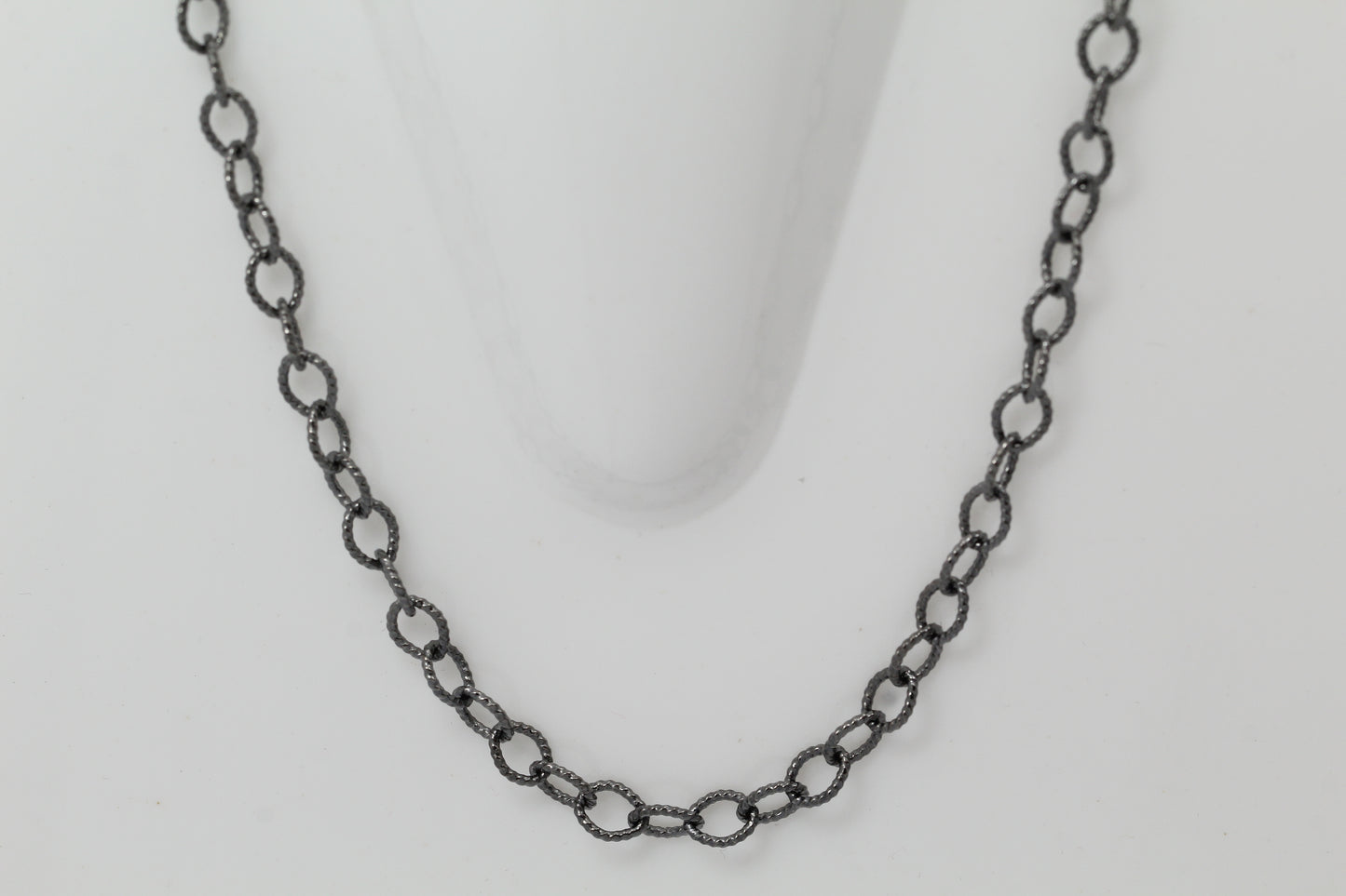 Sterling Silver Black Diamond, 5.4mm Width by 7.2mm Length, 24 Inch Twisted Cable Chain with 11.0mm Length by 3.0mm Thick, Trigger Lobster Clasp. Quantity Per Pack: 1 Piece.