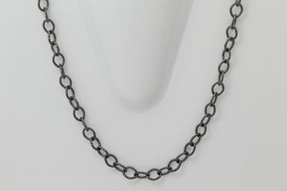 Sterling Silver Black Diamond, 5.4mm Width by 7.2mm Length, 24 Inch Twisted Cable Chain with 11.0mm Length by 3.0mm Thick, Trigger Lobster Clasp. Quantity Per Pack: 1 Piece.