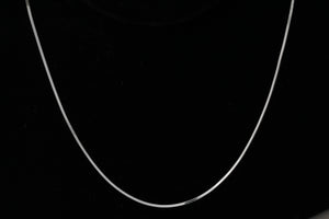 Sterling Silver, 0.8mm Width / Length, 16 Inch Square Regular Snake Chain with 6.0mm Width / Length by 1.4mm Thick, Smooth Spring Ring Clasp and Tags Ends. Quantity Per Pack: 1 Piece.