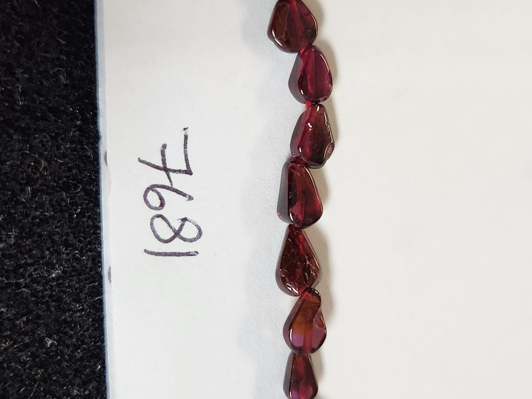 Garnet, 5.4mm Width by 2.9mm Length by 7.5mm Height, Flat Teardrop Stone Bead. Quantity per pack: 56 Pieces.