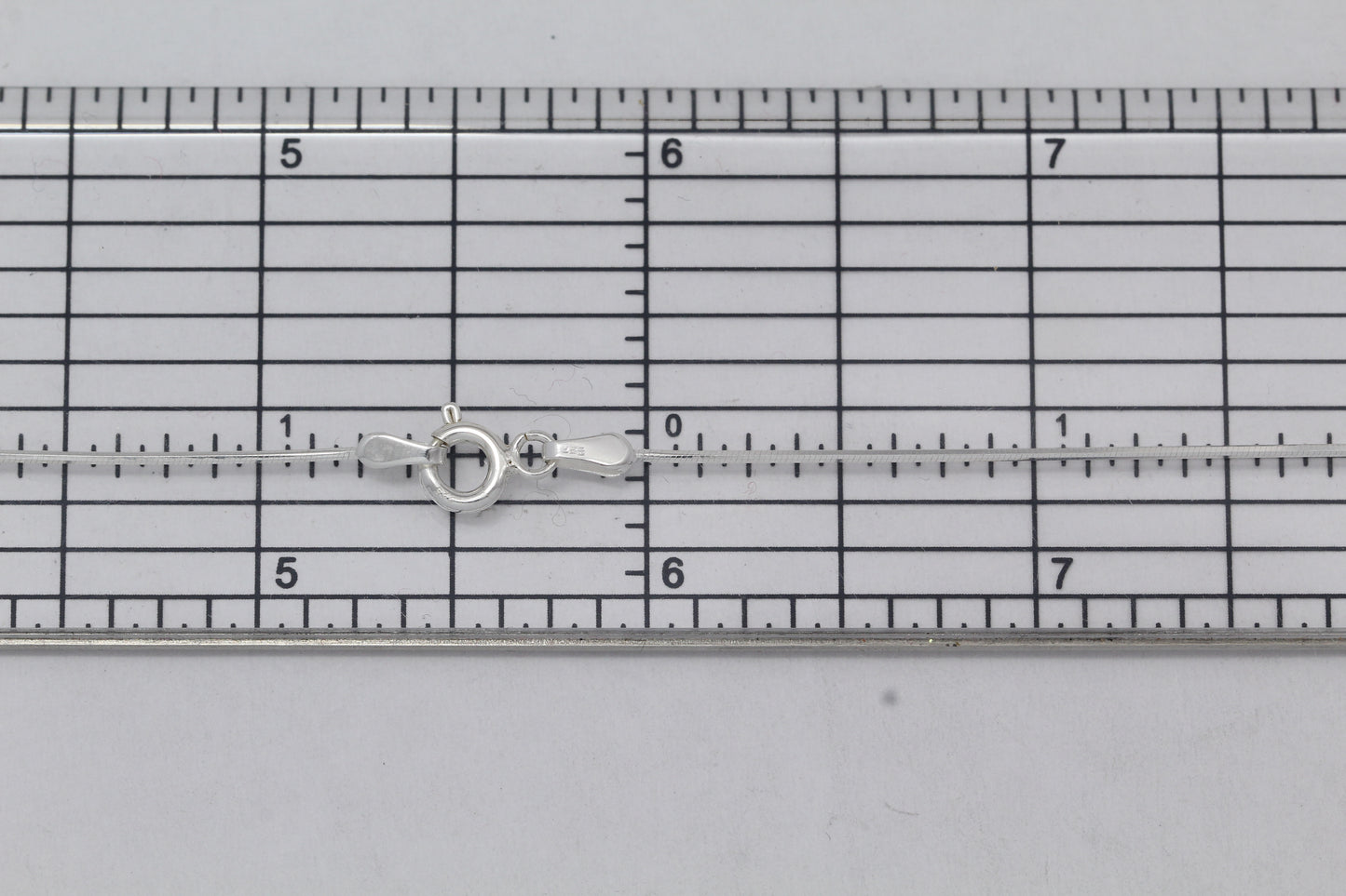 Sterling Silver, 0.7mm Width / Length, 16 Inch Square Regular Snake Chain with 6.0mm Width / Length by 1.4mm Thick, Smooth Spring Ring Clasp and Tags Ends. Quantity Per Pack: 1 Piece.