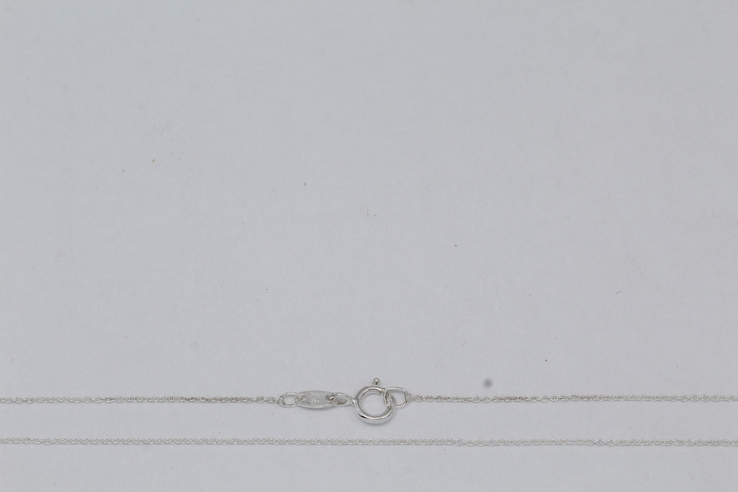 Sterling Silver, 0.8mm Width by 1.0mm Length, 18 Inch Cable Chain with 5.0mm Width / Length by 0.9mm Thick, Smooth Spring Ring Clasp. Quantity Per Pack: 1 Piece.