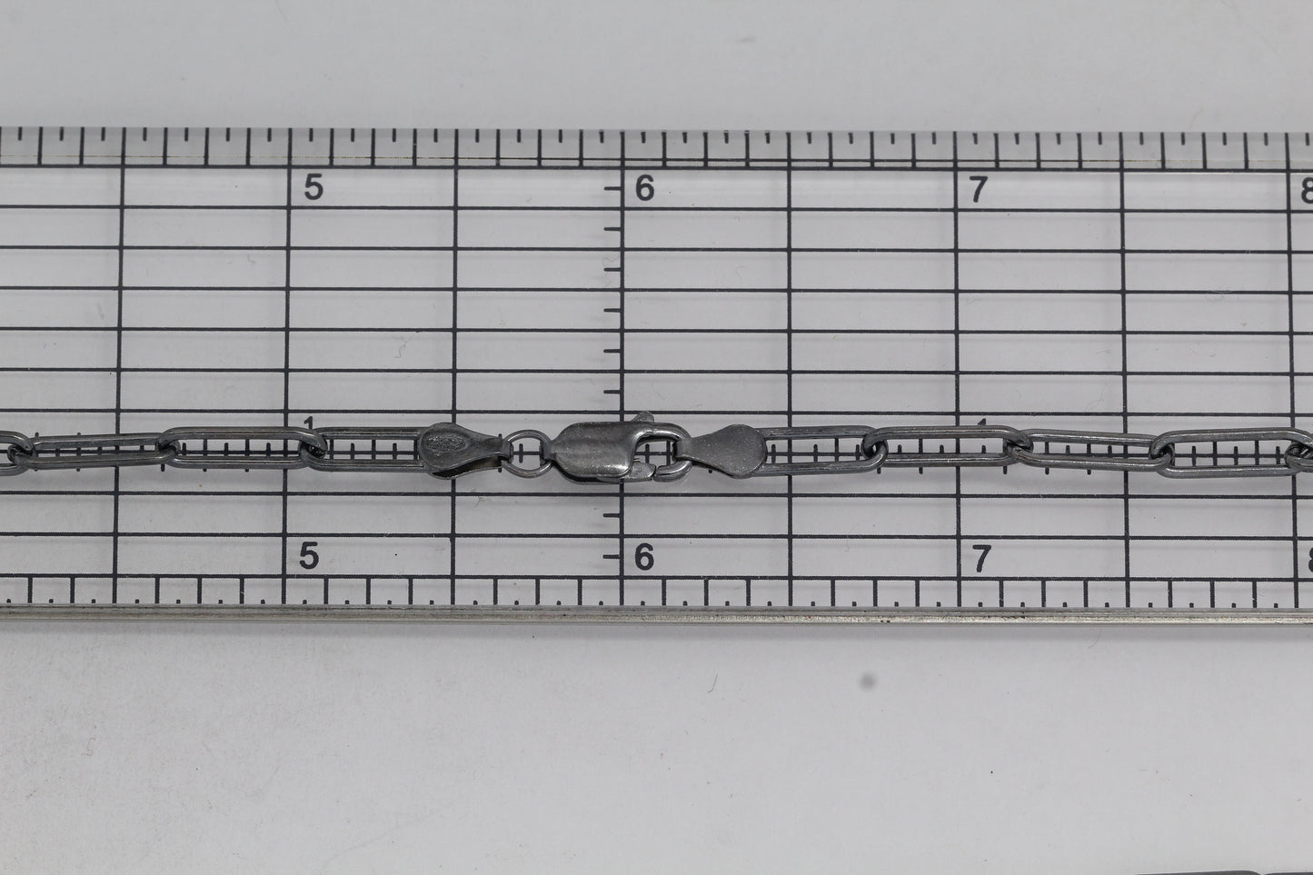 Sterling Silver Black Diamond, 3.8mm Width by 13.1mm Length, 18 Inch Flat Elongated Cable Chain with 11.5mm Length by 2.1mm Thick, Oval Trigger Lobster Clasp. Quantity Per Pack: 1 Piece.