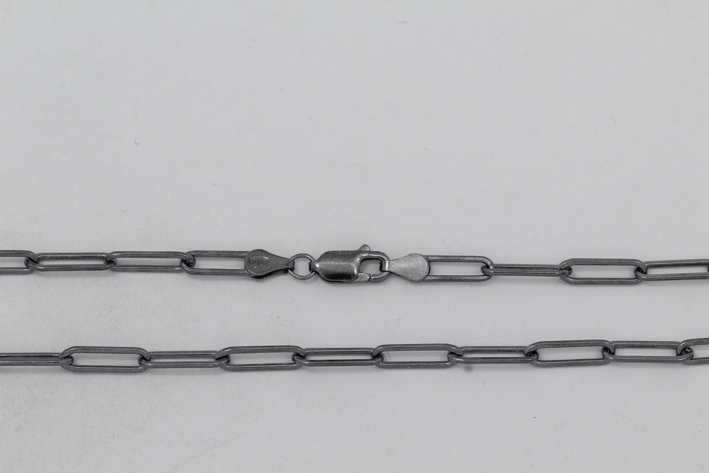 Sterling Silver Black Diamond, 3.8mm Width by 13.1mm Length, 24 Inch Flat Elongated Cable Chain with 11.5mm Length by 2.1mm Thick, Oval Trigger Lobster Clasp. Quantity Per Pack: 1 Piece.
