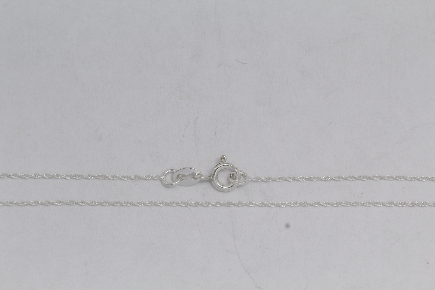 Sterling Silver, 0.8mm Width / Length, 16 Inch Round Regular Rope Chain with 6.0mm Width / Length by 1.4mm Thick, Smooth Spring Ring Clasp. Quantity Per Pack: 1 Piece.