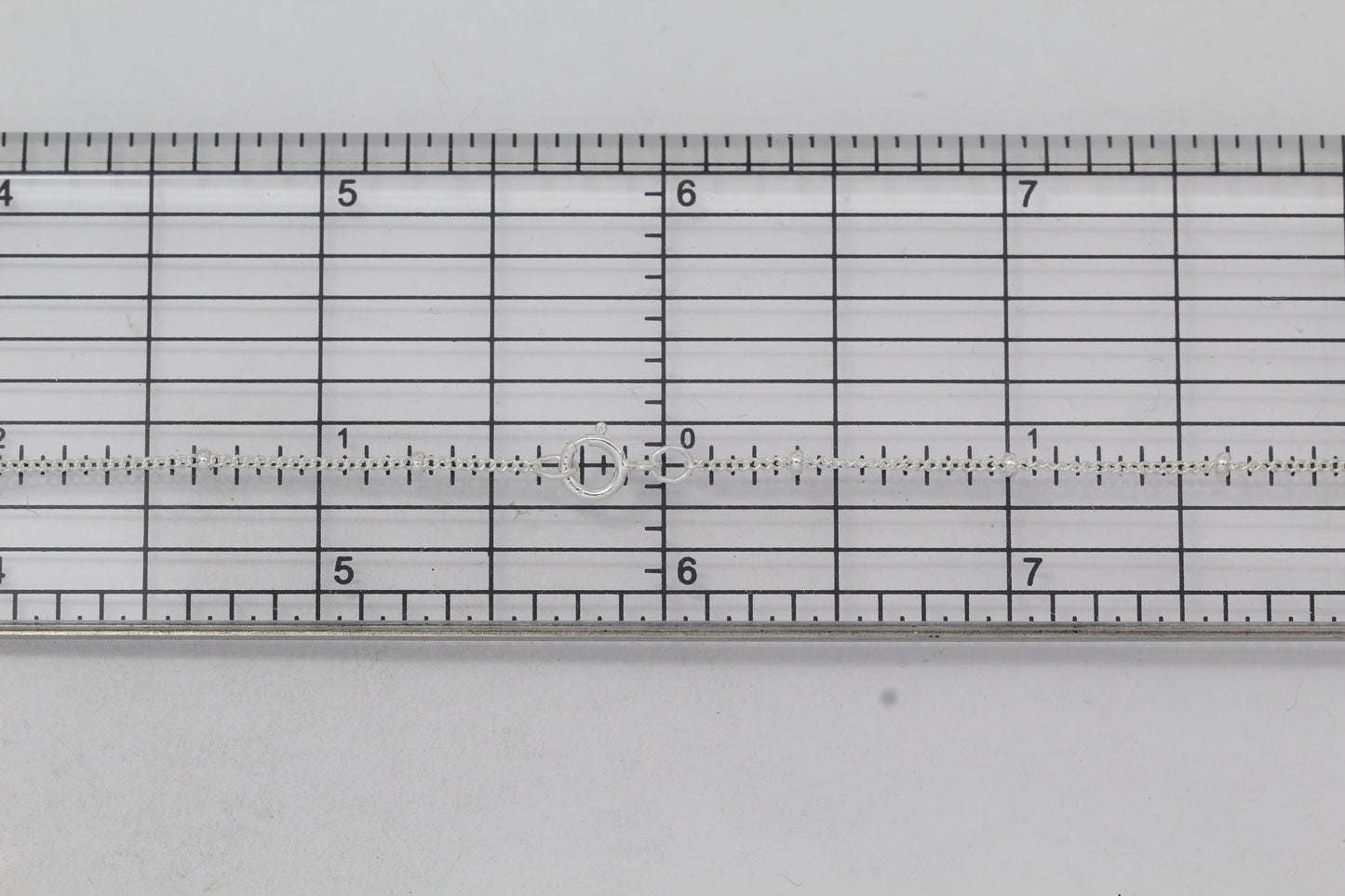 Sterling Silver, 1.0mm Width by 1.9mm Length, 18 Inch Regular Satellite Chain with 5.0mm Width / Length by 1.0mm Thick, Smooth Spring Ring Clasp. Quantity Per Pack: 1 Piece.