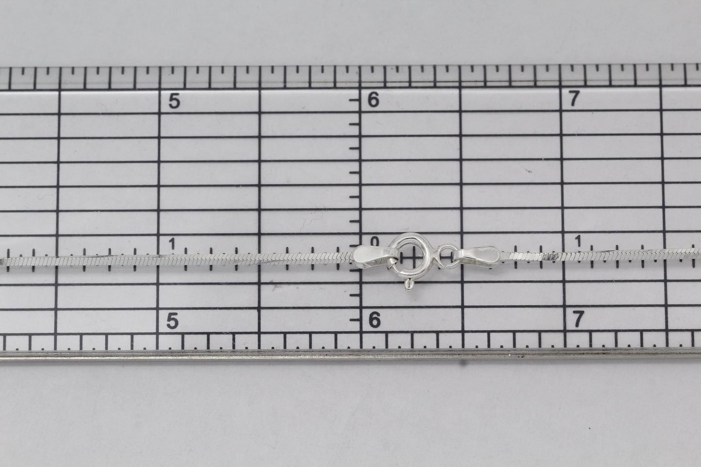 Sterling Silver, 1.0mm Width / Length, 16 Inch Square Regular Snake Chain with 6.0mm Width / Length by 1.4mm Thick, Smooth Spring Ring Clasp and Tags Ends. Quantity Per Pack: 1 Piece.