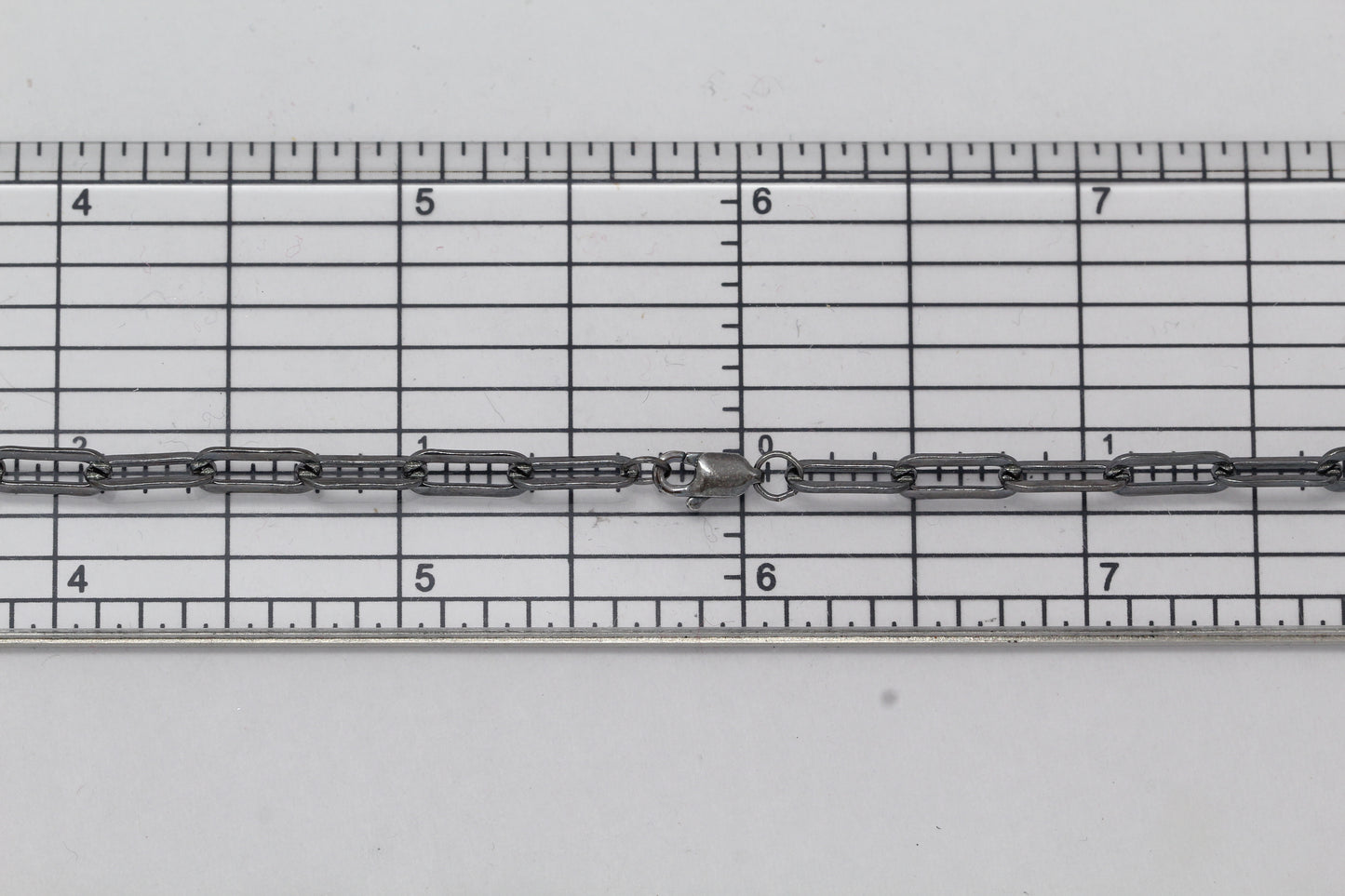 Sterling Silver Black rhodium, 3.8mm Width by 9.8mm Length, 18 Inch Elongated Cable Chain with 8.5mm Length by 2.1mm Thick, Oval Trigger Lobster Clasp. Quantity Per Pack: 1 Piece.