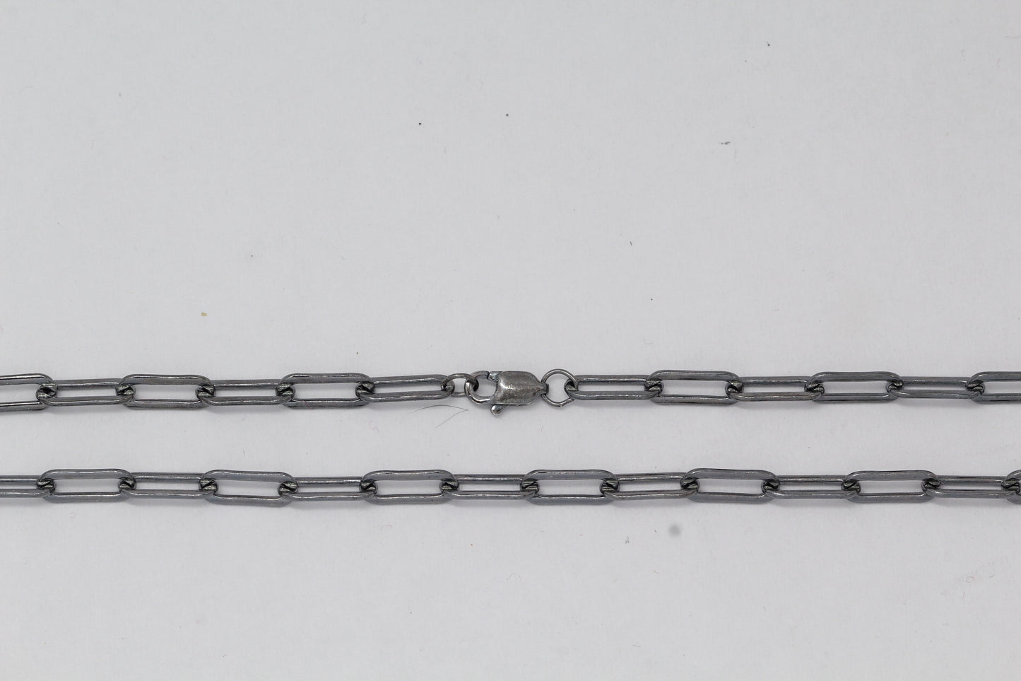 Sterling Silver Black rhodium, 3.8mm Width by 9.8mm Length, 18 Inch Elongated Cable Chain with 8.5mm Length by 2.1mm Thick, Oval Trigger Lobster Clasp. Quantity Per Pack: 1 Piece.