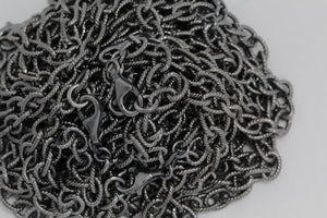 Sterling Silver Black Diamond, 5.8mm Width by 8.4mm Length, 24 Inch Twisted Cable Chain with 13.0mm Length by 3.0mm Thick, Trigger Lobster Clasp. Quantity Per Pack: 1 Piece.