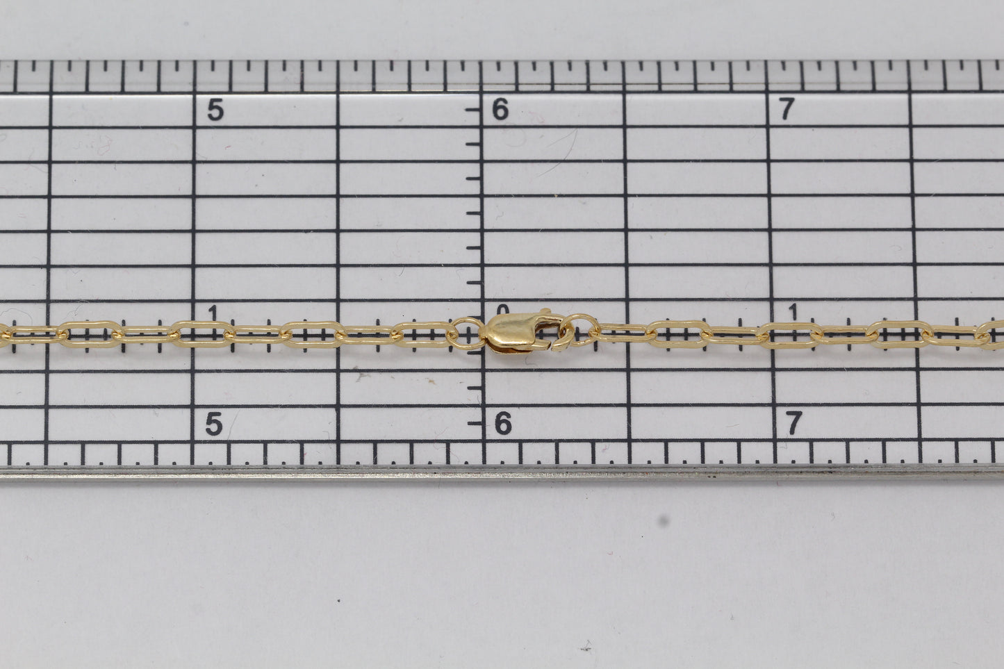 Gold Filled, 2.6mm Width by 6.1mm Length, 18 Inch Flat Elongated Cable Chain with 8.5mm Length by 2.1mm Thick, Oval Trigger Lobster Clasp. Quantity Per Pack: 1 Piece.