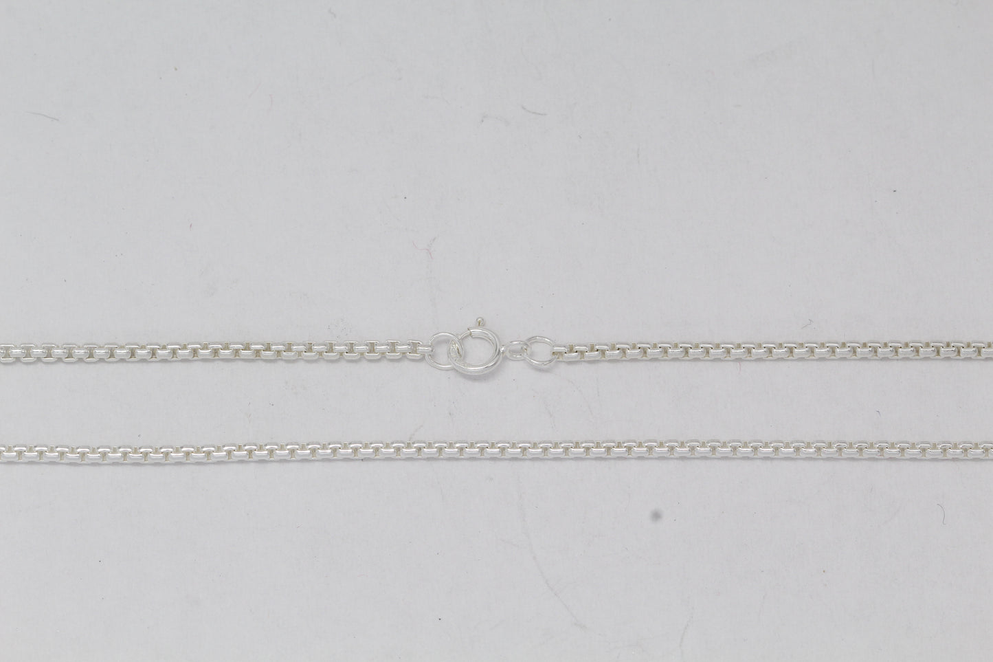 Sterling Silver, 1.8mm Width / Length, 24 Inch Rounded Box Chain with 6.0mm Width / Length by 1.4mm Thick, Smooth Spring Ring Clasp. Quantity Per Pack: 1 Piece.