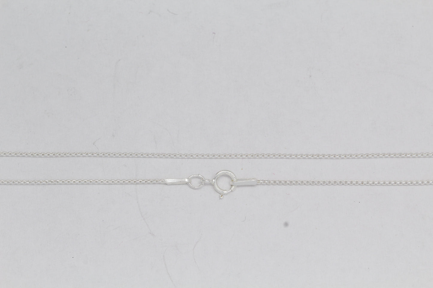 Sterling Silver, 1.0mm Width / Length, 18 Inch Rounded Box Chain with 6.0mm Width / Length by 1.4mm Thick, Smooth Spring Ring Clasp. Quantity Per Pack: 1 Piece.