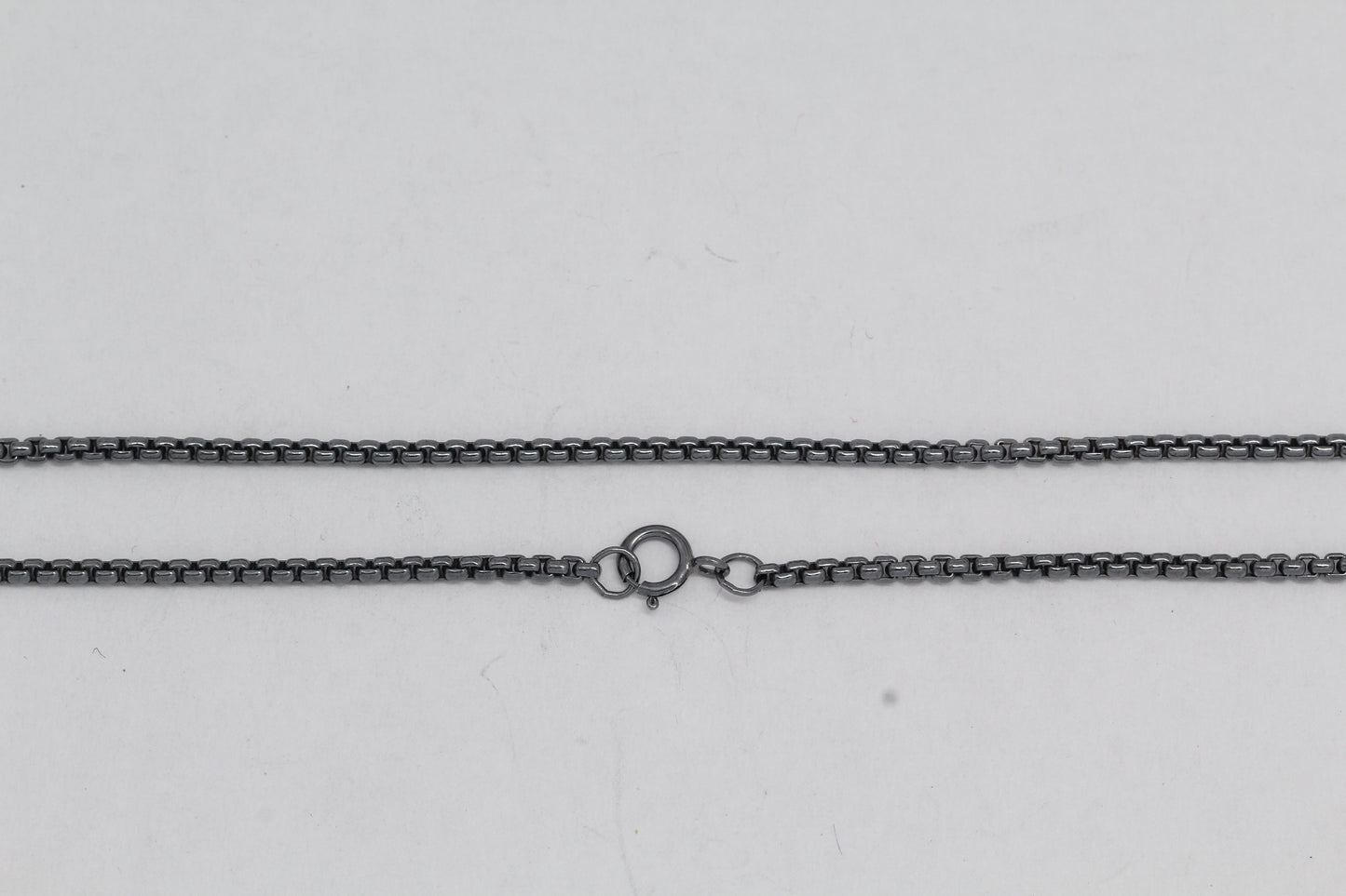 Sterling Silver Black Diamond, 1.8mm Width / Length, 24 Inch Rounded Box Chain with 6.0mm Width / Length by 1.4mm Thick, Smooth Spring Ring Clasp. Quantity Per Pack: 1 Piece.