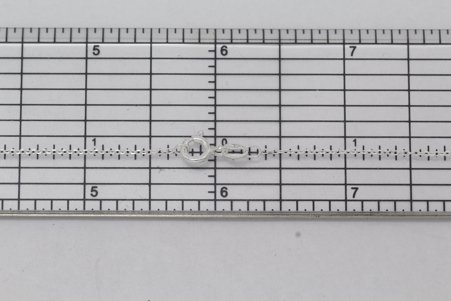 Sterling Silver, 1.2mm Width by 1.8mm Length, 18 Inch Flat Cable Chain with 6.0mm Width / Length by 1.4mm Thick, Smooth Spring Ring Clasp. Quantity Per Pack: 1 Piece.