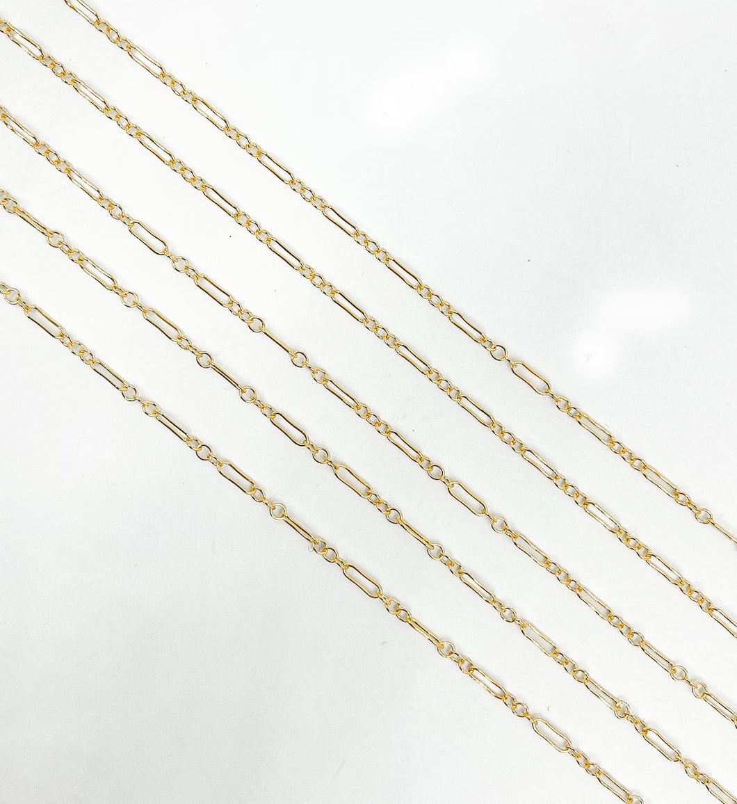 14kt Gold Filled One of 1.6mm Width by 5.0mm Length Smooth Larger Oval Link Followed by Three of 1.6mm Width by 2.0mm Length Smooth Smaller Oval Links With Middle Smaller Oval Link, Long and Short Chain. Price per: 1 Foot.