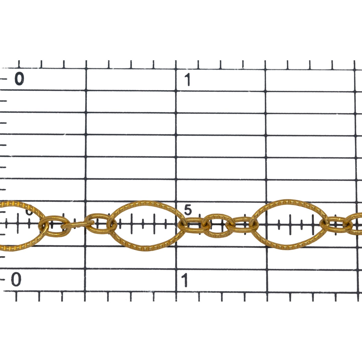 14kt Gold Filled One of 7.1mm Width by 10.8mm Length, Longer Corrugated Oval Link Connected to Three of 3.57mm Width by 4.67mm Length, Smaller Oval Links with Middle Smaller Oval Link being Corrugated, Long and Short Chain. Price Per: 1 Foot.