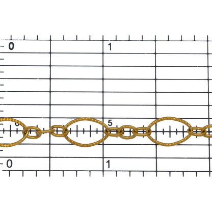 14kt Gold Filled One of 7.1mm Width by 10.8mm Length, Longer Corrugated Oval Link Connected to Three of 3.57mm Width by 4.67mm Length, Smaller Oval Links with Middle Smaller Oval Link being Corrugated, Long and Short Chain. Price Per: 1 Foot.