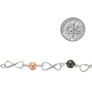 Sterling Silver 6.0mm Width by 14.8mm Length, Figure 8 Chain With Alternating Wire Wrapped 6.0mm Peach and Grey Swarovski Pearls connected to the Figure 8 Link With a 4.0mm Open ring, Figure 8 Chain. Price per: 1 Inch.