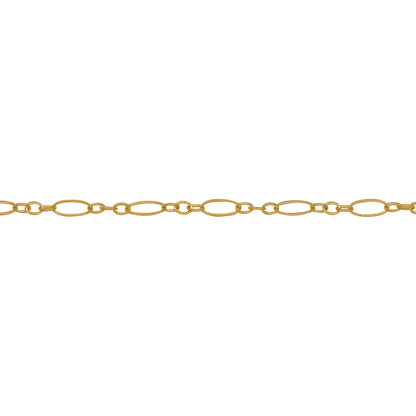 Chain by Foot. 14kt Gold Filled One of 2.5mm Width by 5.0mm Length, Longer Corrugated Oval Link Connected to Three of 1.5mm Width by 2.0mm Length, Smaller Oval Links with Middle Smaller Oval Link being Corrugated, Long and Short Chain. Price Per: 1 Foot.