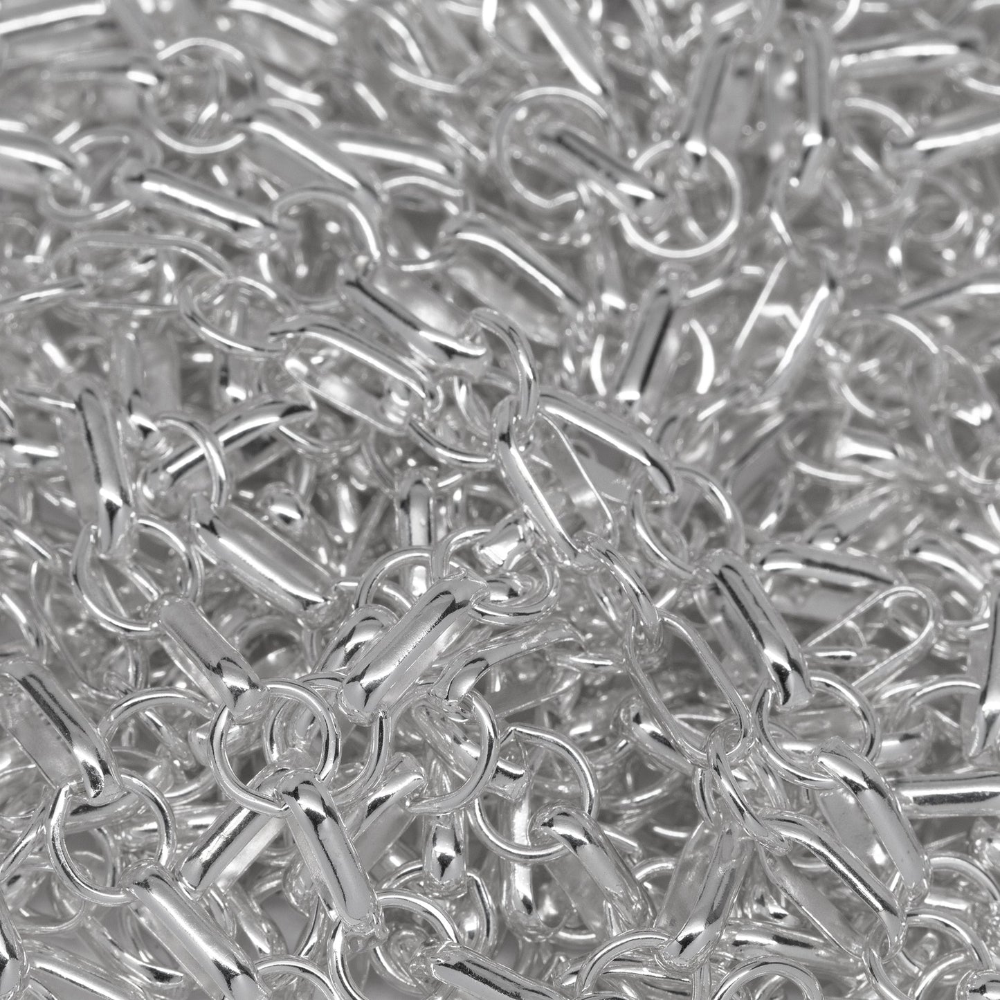 Sterling Silver 3.5mm Width by 7.7mm Length Oval Rolo Link Followed by 5.5mm Circle Link, South West Chain. Price per: 1 Foot.