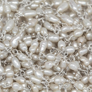 Brass Silver Plated 3.0mm Width by 5.0mm Length Fresh Water White Rice Pearl Chain. Price per: 1 Inch.