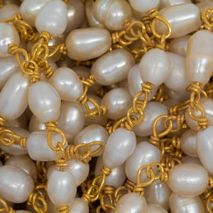 Brass Gold Plated / Vermeil 3.0mm Width by 5.0mm Length Fresh Water White Rice Pearl Chain. Price per: 1 Inch.