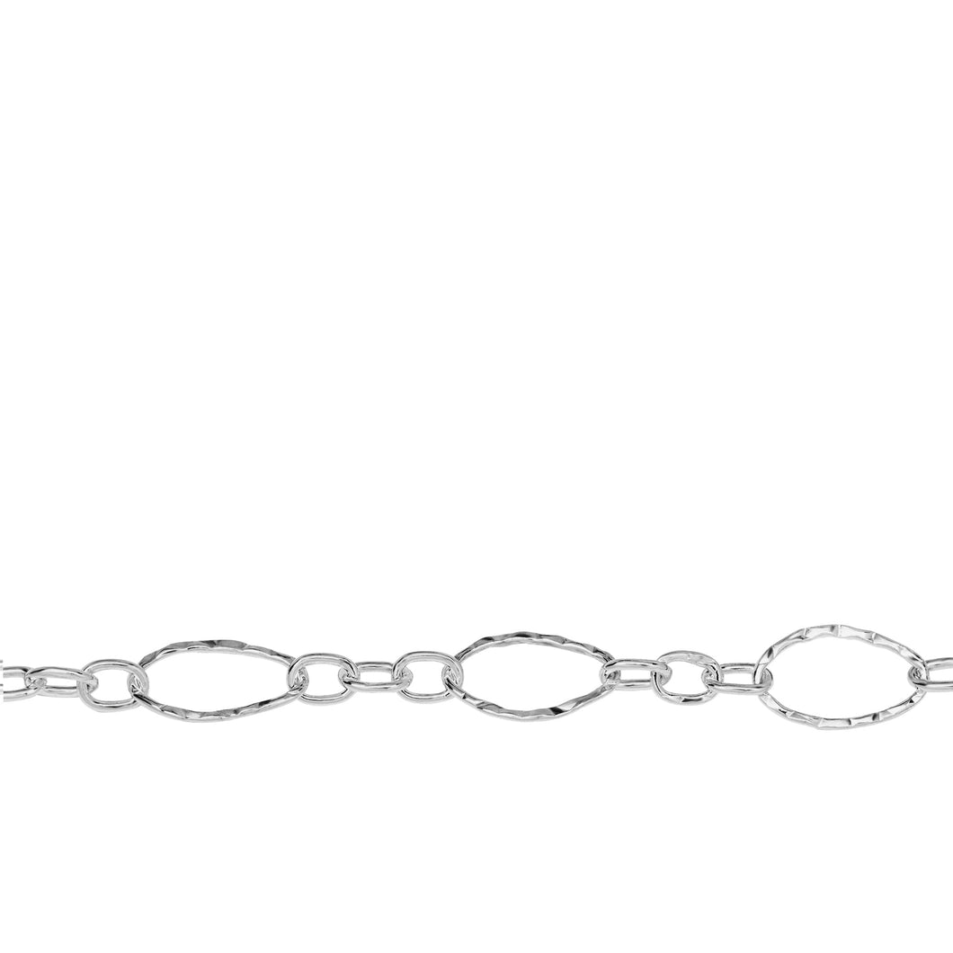 Chain by Foot. Sterling Silver One of 6.8mm Width by 11.0mm Length, Larger Hammered Oval Link Followed by Three of 3.5mm Width by 4.7mm Length Smaller Links with Middle Smaller Link Being Hammered, Long and Short Chain. Price per: 1 Foot.