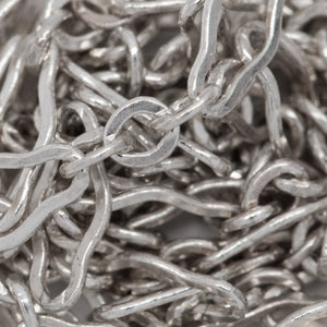 Sterling Silver 3.1mm Width by 6.7mm Length, Larger Flat Oval Link Followed by 2.2mm Width by 2.4mm Length, Three of Smaller Oval Flat Links, Long and Short Chain. Price per: 1 Foot.