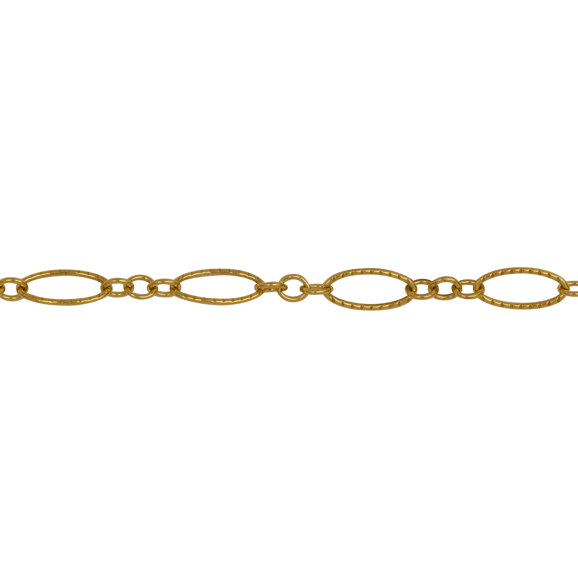 Chain by Foot. 14kt Gold Filled One of 4.1mm Width by 7.8mm Length Corrugated Long Oval Link Followed by Three of 2.5mm Width by 3.0mm Length Smaller Oval Links With Middle Smaller Oval Link Being Smooth, Long and Short Chain. Price per: 1 Foot.
