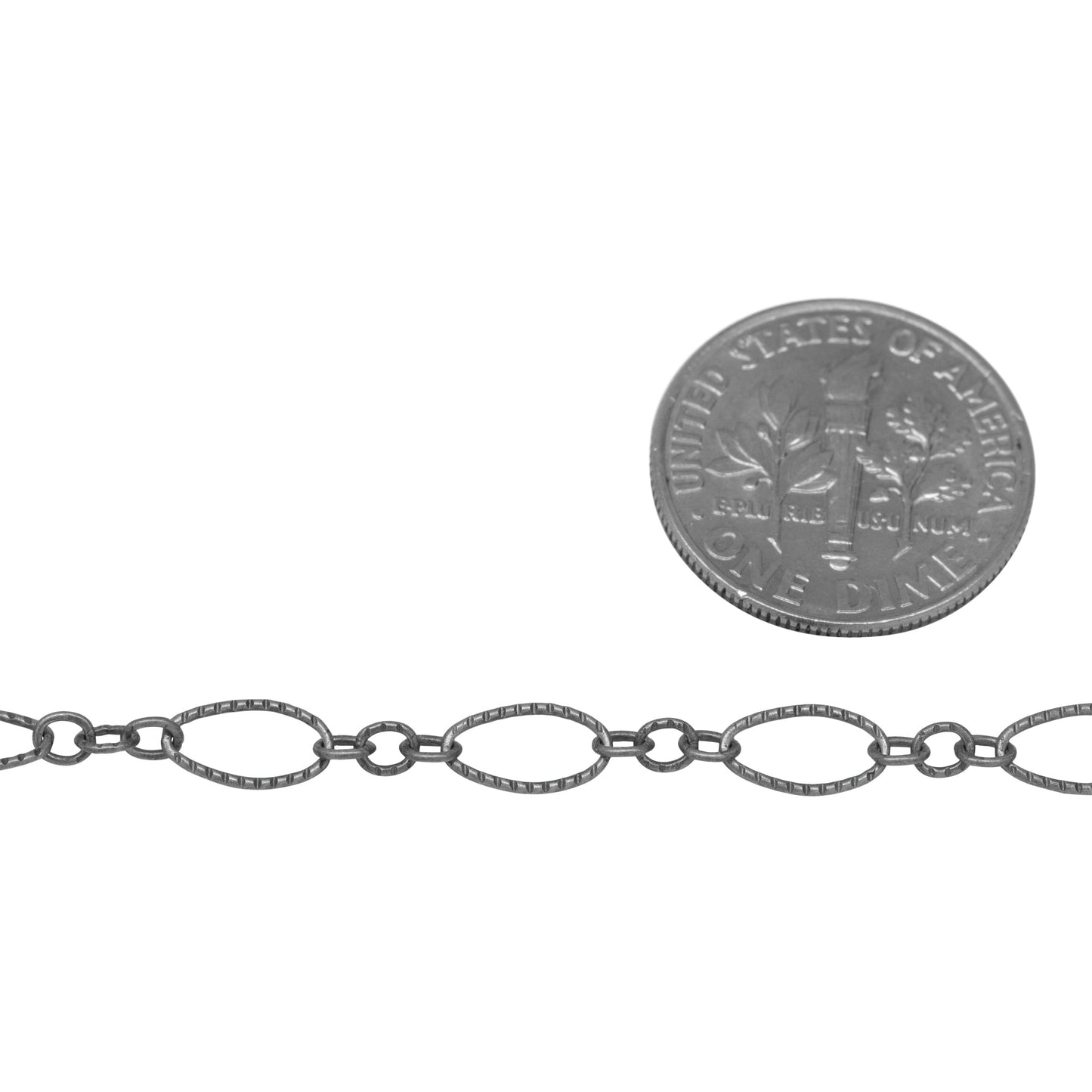 Sterling Silver Oxidized One of 4.1mm Width by 7.8mm Length Corrugated Long Oval Link Followed by Three of 2.5mm Width by 3.0mm Length Smaller Oval Links With Middle Smaller Oval Link Being Smooth, Long and Short Chain. Price per: 1 Foot.