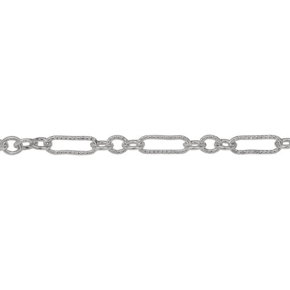 Chain by Foot. Sterling Silver One of 3.1mm Width by 9.4mm Length Corrugated Elongated Oval Link Followed by Three of 3.1mm Width by 4.0mm Length Smooth Oval Links with Middle Oval Link being Corrugated, Long and Short Chain. Price per: 1 Foot.