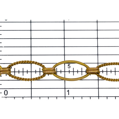 14kt Gold Filled One of 8.5mm Width by 14.5mm Length Smooth Oval Link and One of 8.0mm Width by 14.5mm Length Twisted Oval Link Connected with Double 3.0mm Width by 6.0mm Length Oval Rolo Links, Long and Short Chain. Price per: 1 Foot.