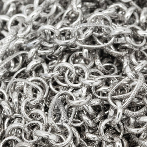 Sterling Silver Oxidized Five of 6.0mm Width / Length Rolo Links Connected to One of 6.0mm Width by 10.8mm Length slightly Twisted Textured Oval Rolo Link, Rolo Chain. Price per: 1 Foot.