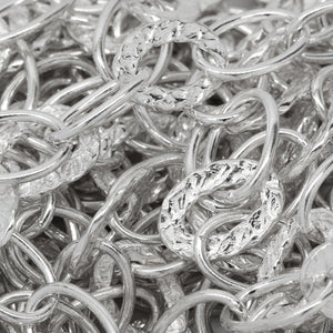 Sterling Silver Two of 8.3mm Width by 11.8mm Length Smooth Oval Links Followed by One of 9.0mm Width by 12.0mm Length Hammered Oval Link, Cable Chain. Price per: 1 Foot.