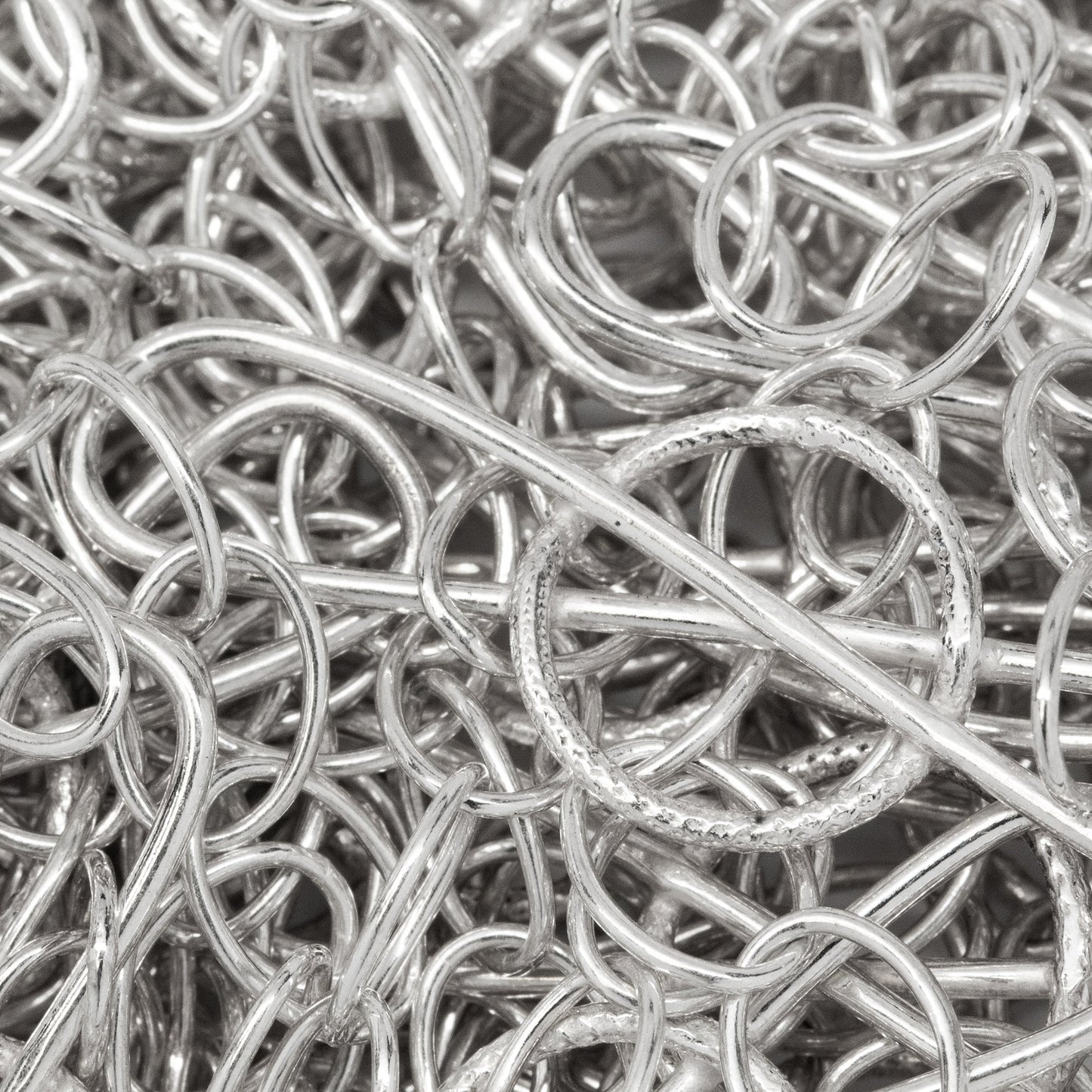 Sterling Silver Fifteen of 5.9mm by 7.8mm Smooth Oval Cable Chain Links Connected With 10.9mm by 33.6mm Figure 8 Link, Fancy Chain. Price per: 1 Foot.