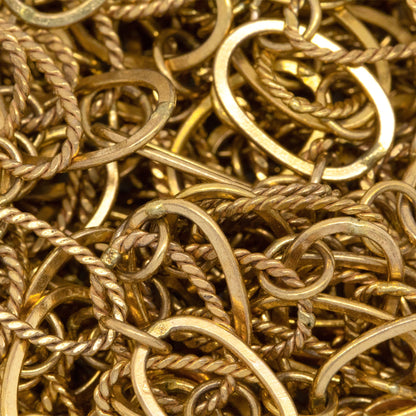 14kt Gold Filled Flat and Twisted 8.06mm Width by 13.20mm Length Oval Links Connected by 5.2mm Open Ring, Long and Short Chain. Price per: 1 Foot.