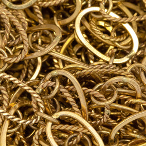 14kt Gold Filled Flat and Twisted 8.06mm Width by 13.20mm Length Oval Links Connected by 5.2mm Open Ring, Long and Short Chain. Price per: 1 Foot.