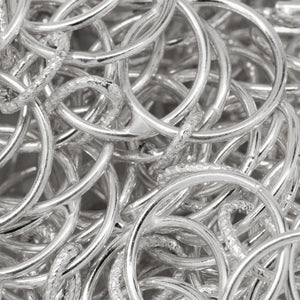 Sterling Silver Two of 11.3mm Smooth Circles Links - Figure 8 Link, overlapping creating a Marquise in the center connected by 4.5mm width by 6.5mm length Textured Oval Link, Figure 8 Chain. Price per: 1 Foot.