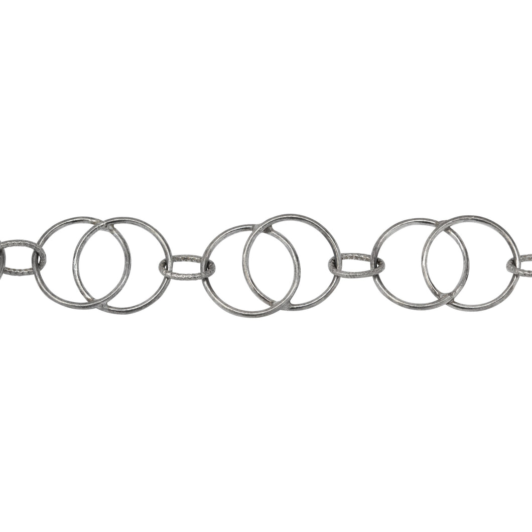 Chain by Foot. Sterling Silver Oxidized Two of 11.3mm Smooth Circles Links - Figure 8 Link, overlapping creating a Marquise in the center connected by 4.5mm width by 6.5mm length Textured Oval Link, Figure 8 Chain. Price per: 1 Foot.