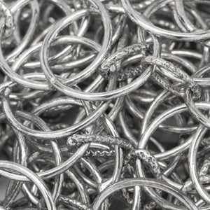 Sterling Silver Oxidized Two of 11.3mm Smooth Circles Links - Figure 8 Link, overlapping creating a Marquise in the center connected by 4.5mm width by 6.5mm length Textured Oval Link, Figure 8 Chain. Price per: 1 Foot.