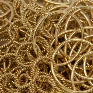 14kt Gold Filled Two 22.0mm Smooth Circles Overlapping And Soldered together Connected By Six 9.8mm Twisted Circle Links, Figure 8 Chain. Price per: 1 Foot.